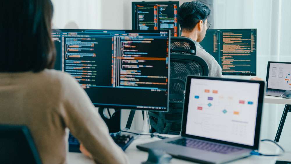 Developers writing code or collaborating